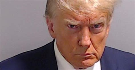 Trump’s mug shot is released, a first in his four criminal cases this year. - Overpasses For America