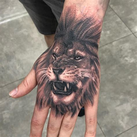 Roaring Lion on Hand Tattoo