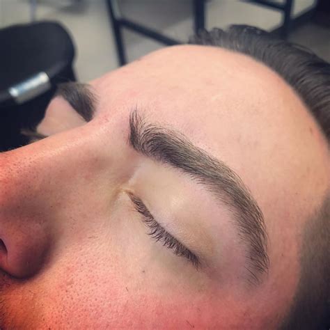 Men’s brow waxing needs to maintain a clean but full look. This client ...