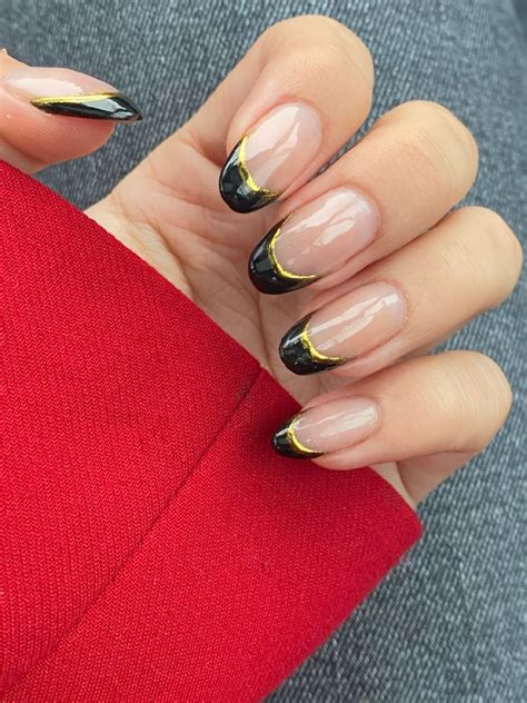 Black & gold french nails | Gold nails french, Gold gel nails, Black gold nails