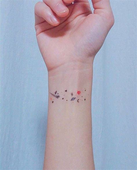 Minimalist galaxy tattoo on the left inner wrist.... - Little Tattoos for Men and Women Mini ...