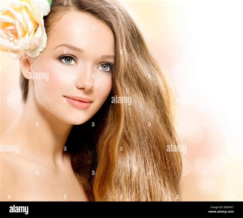 Beauty Girl. Beautiful Model with Rose Flower Stock Photo - Alamy