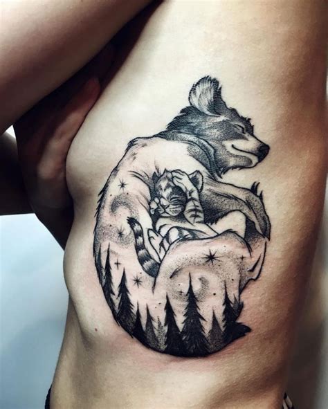 Momma wolf and baby wolf tattoo inked on the left rib cage by Sasha Tattooing | Animal lover ...