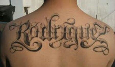 Old English Cursive Tattoo