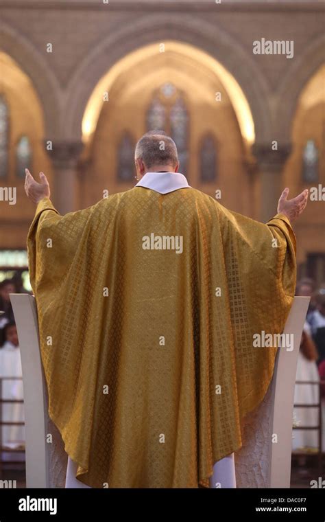 Priest during Eucharist celebration, Paris, France, Europe Stock Photo - Alamy