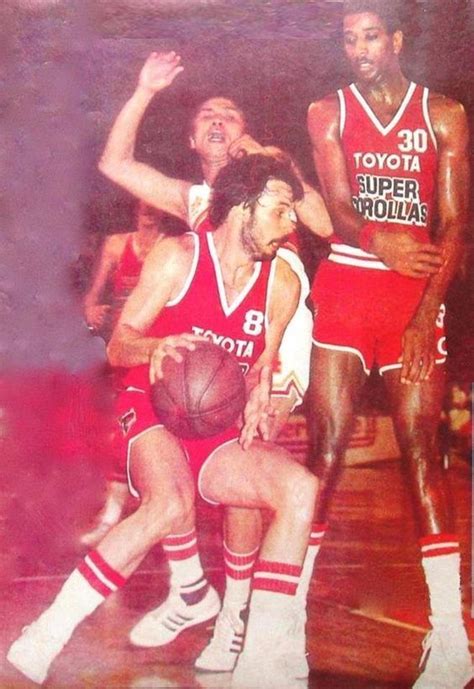 "Mr. Clutch" Francis Arnaiz dribble the ball with the import Donnie Ray Koonce of their Toyota ...