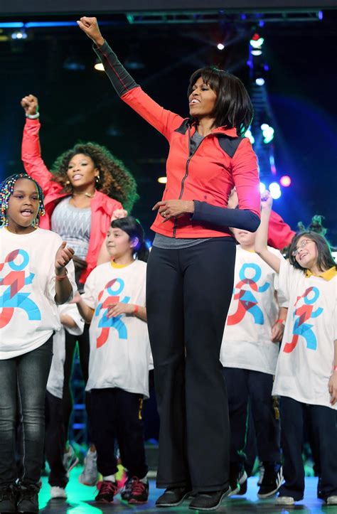 Michelle Obama Leads 6,000 Kids in Workout Routine - Essence | Essence