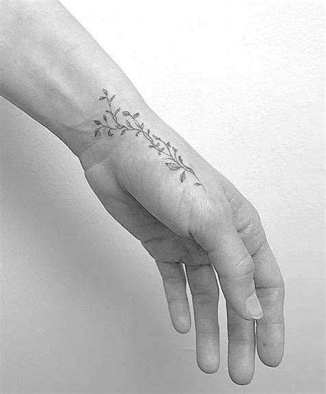 small vine wrist tattoos - Google Search (With images) | Hand tattoos for women, Wrap around ...