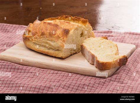 Bread on a chopping board Stock Photo - Alamy