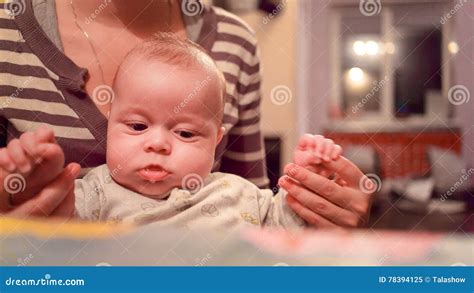 Child on the Lap of the Mother Stock Image - Image of brother, people: 78394125