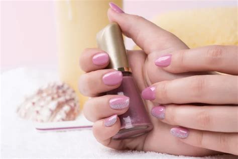 Fingernails with pink polish and glitter | Stock Images Page | Everypixel