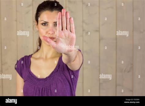 Portrait of beautiful woman with stop sign Stock Photo - Alamy