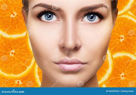 Young Woman Over Orange Fruit Slices Background. Stock Image - Image of color, health: 96259343