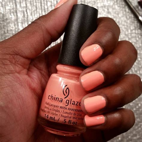 China Glaze "Flip Flop Fantasy" on dark skin. Peach nail polish on dark skin. Nail polish on ...