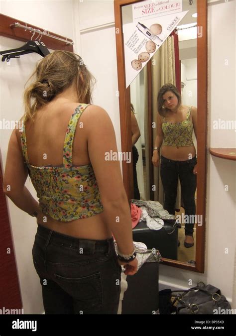 teenage girl trying on clothes in changing room Stock Photo, Royalty Free Image: 30803317 - Alamy