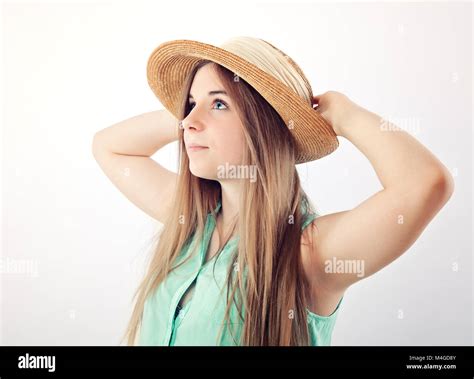 teenage girl wearing sun hat Stock Photo - Alamy