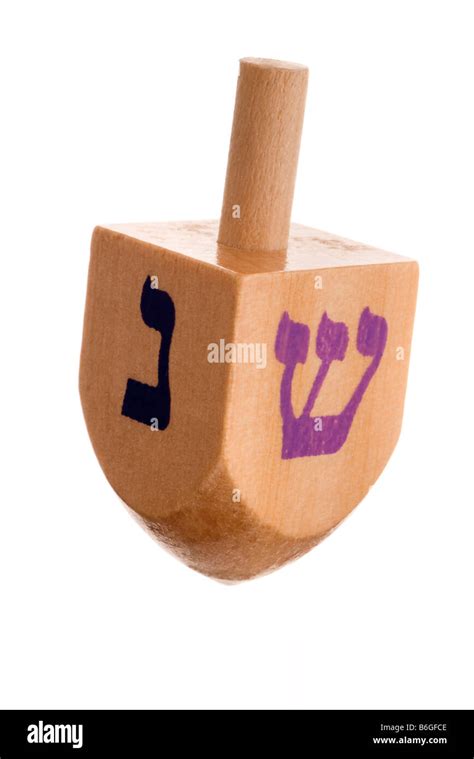 Hanukkah dreidel isolated on white Stock Photo - Alamy