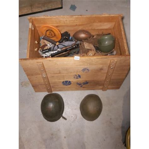 Wooden toy chest with army toys, including 2 World War 2 helmets (35" W, 18" D, 15" H) - Beck ...