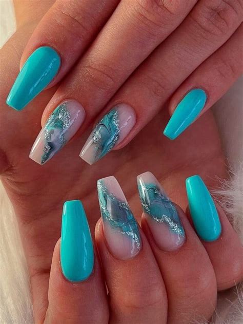 Long, coffin-shaped turquoise nails with marble effect | Turquoise nails, Teal nails, Teal nail ...