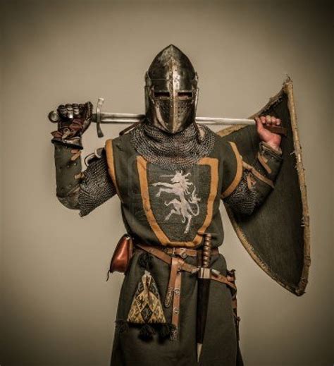 Medieval knight with a sword Stock Photo - 15599718 Medieval Ages, Medieval Weapons, Medieval ...