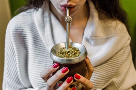 Young Argentinian woman drinking yerba mate | Insight Guides Blog