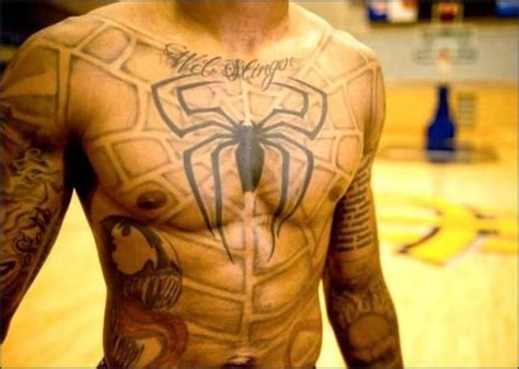 Spiderman Symbol Tattoo On Chest