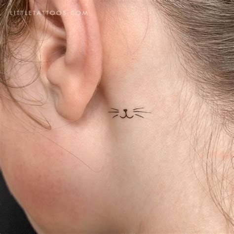 Small minimalist cat whiskers temporary tattoo located