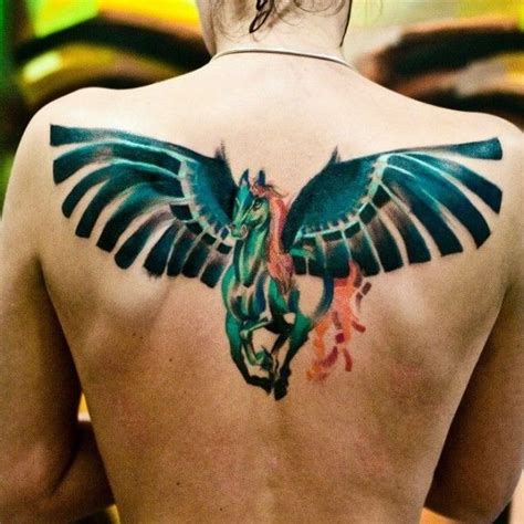 Torquoise pegasus with unusual wings tattoo on upper arm | Pegasus tattoo, Tattoos, Horse tattoo