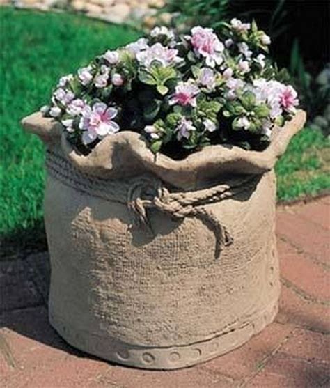 How To Make Cement Garden Planters / Remodelaholic | DIY Cement Planters and Garden Globes ...