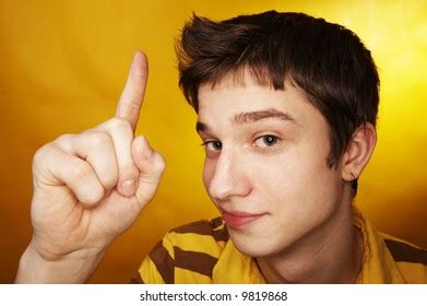 Yellow Background Man Finger Stock Photo 9819868 | Shutterstock