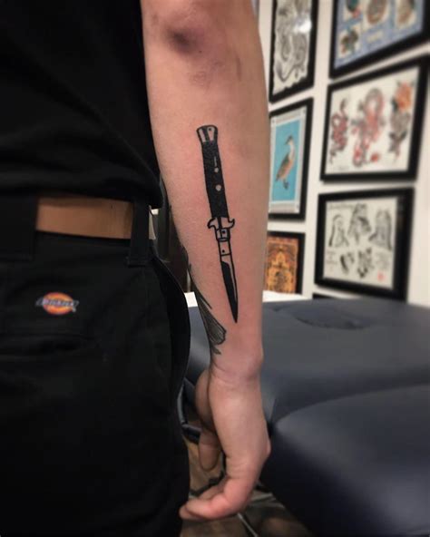 Black switchblade by @lonewolftattoo - Tattoogrid.net