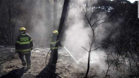 Israel wildfires: Haifa residents go home; fires under control - CNN