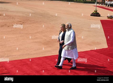 Italian Premier Giorgia Meloni, left, is received by Indian Prime ...