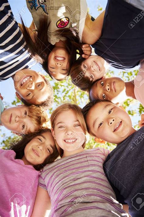 Group of kids outdoors looking down at camera,vertical | Kids photoshoot, Kids groups, Kids photos