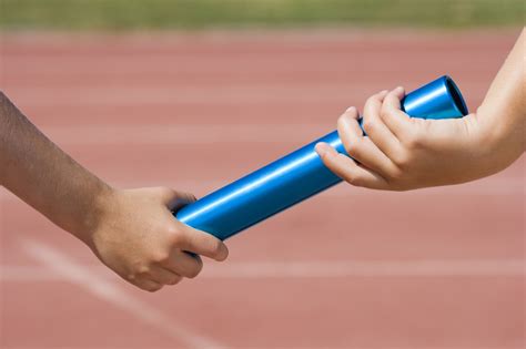 People exchanging baton Free Photo Download | FreeImages