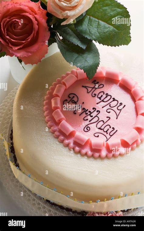 Birthday cake with the words Happy Birthday roses FoodCollection Stock ...