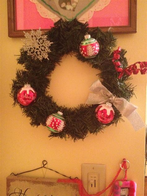 Got a wreath from JoAnn Fabrics for a few dollars! I got the ornaments, small decorations, and ...