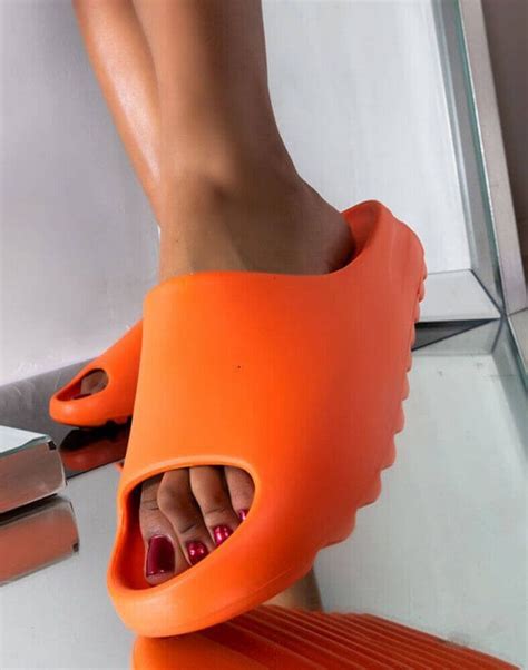 Looking at the Features of Orange Yeezy Slides | eBay