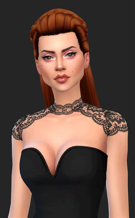 a woman with red hair wearing a black dress and lace collared neckline is shown