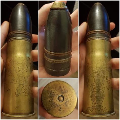 This is a WW1 trench art, French 37mm Hotchkiss artillery shell, made by Pinchard et Denys in ...