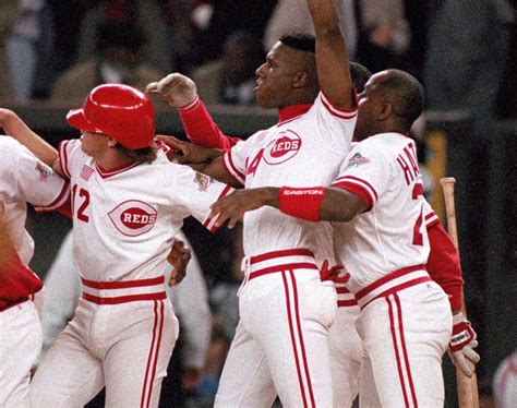 The Reds are wearing 1990 throwback uniforms; no buttons, no belts, no ...