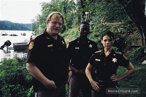 Lake Placid - Publicity still of Brendan Gleeson & Meredith Salenger