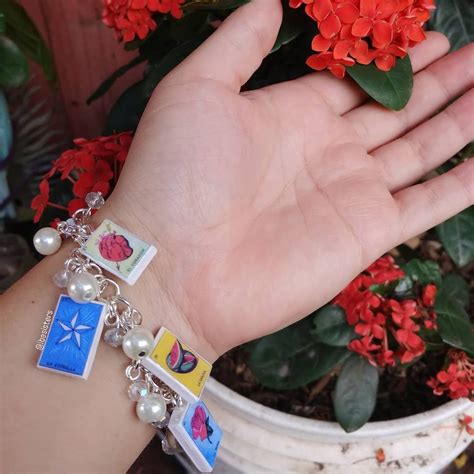 Buena suerte on my wrist! Loteria polymer clay charm bracelet handmade Iba Sisters handmade ...