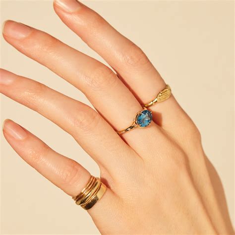 Moons of Neptune Blue Topaz Ring with Diamonds in 14K Gold | Catbird