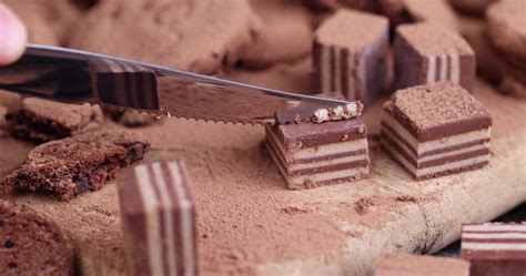 cutting candy on a board with a knife 10236526 Stock Photo at Vecteezy