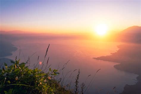 Sunrise over Lake Atitlan, Guatemala [oc] : r/travel