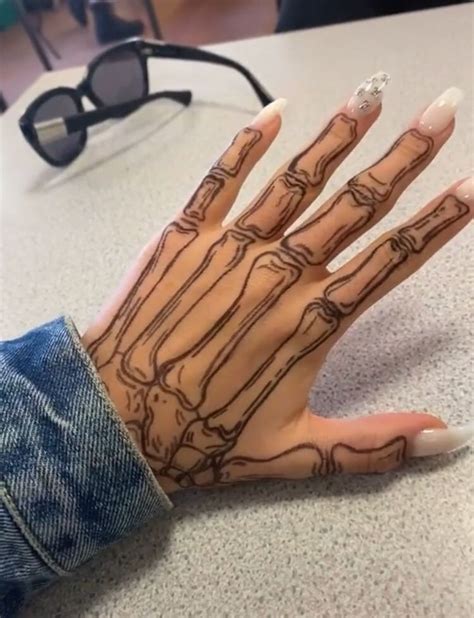 𝐇𝐄𝐑 // 𝐁.𝐄 | Skeleton hand tattoo, Hand tattoos, Sharpie tattoos