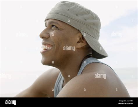 Man wearing cap backwards laughing hi-res stock photography and images - Alamy