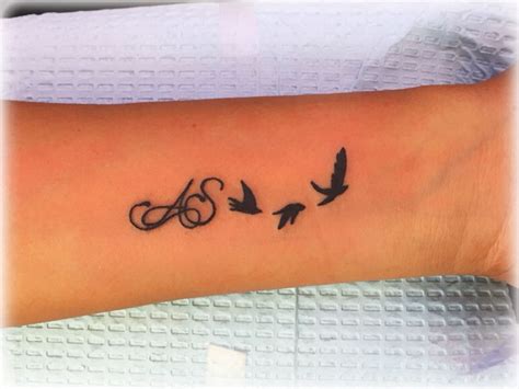 Initial tattoo with birds, small birds tattoo, bird silhouette tattoo, done by jenny forth at ...