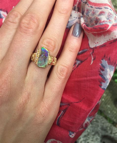 Artemis Boulder Opal and mixed diamond engraved shield ring. #netaporter… Netaporter, Boulder ...